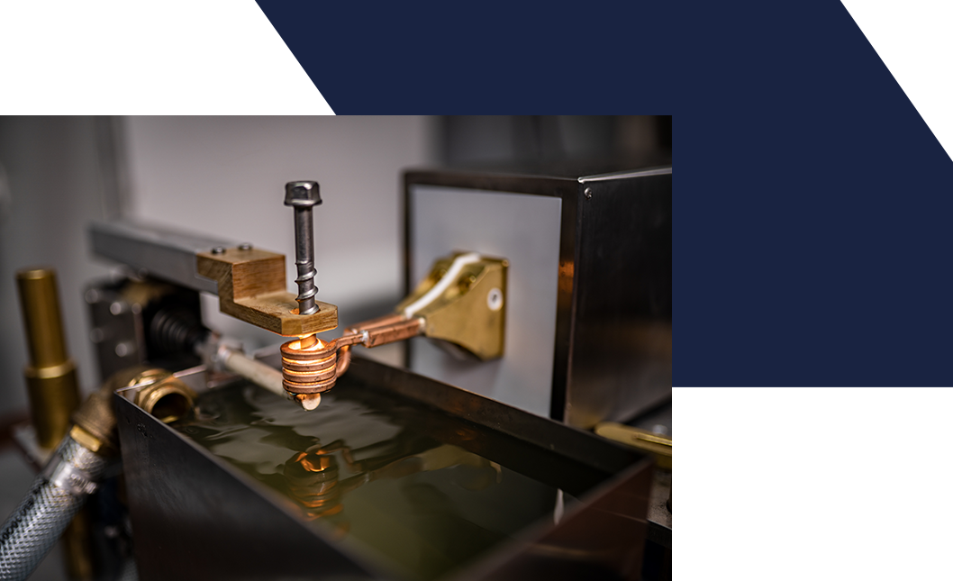 Rapid hardening of a screw: inductor with screw over cooling basin