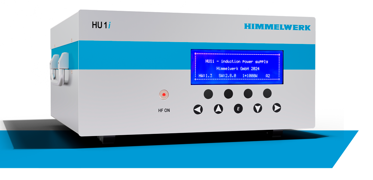 HU 1i table top induction converter. a light grey box with blue accents, buttons and an interface display